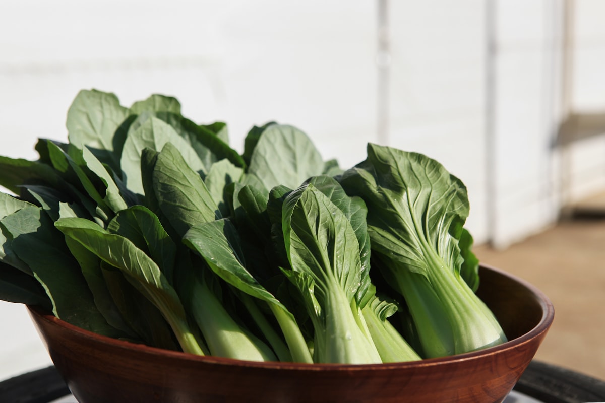 Steamed vegetables in a bamboo steamer
