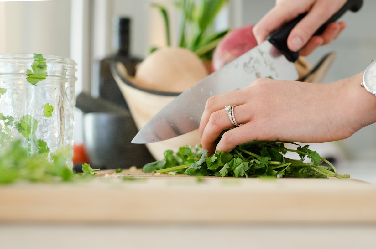 Vegetables being stir-fried in a wok